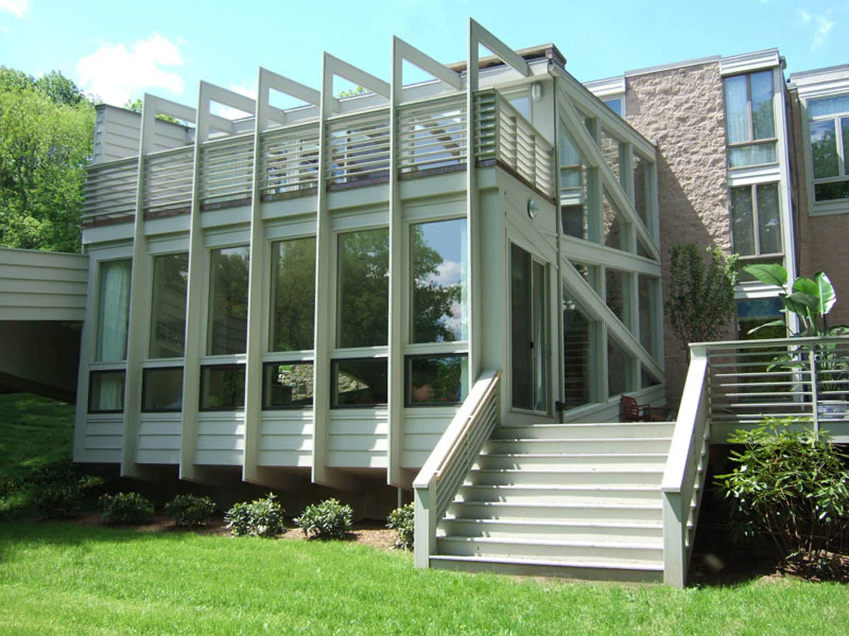 Rear of Modern Le Corbusier Villa Savoye inspired ramp flying beams