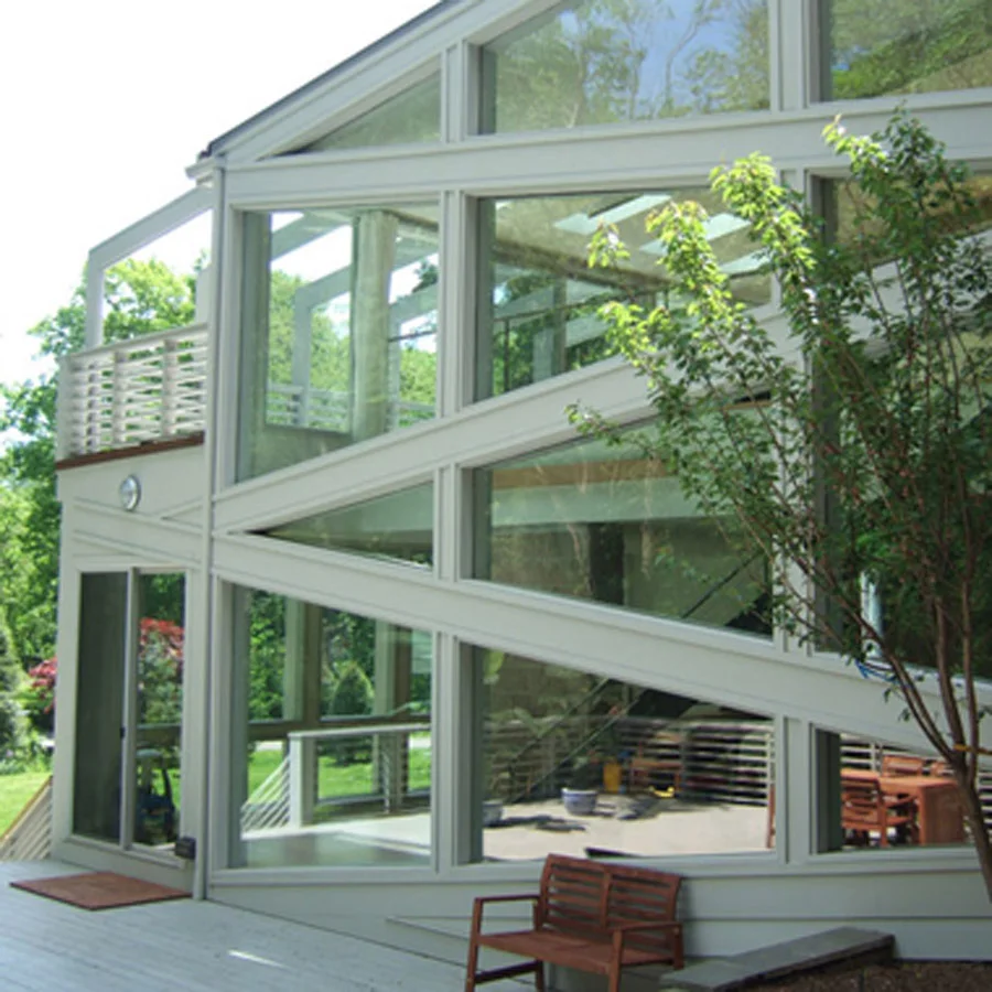 Modern Greenwich CT light filled glass box indoor outdoor flying beams horizontal railing contemporary