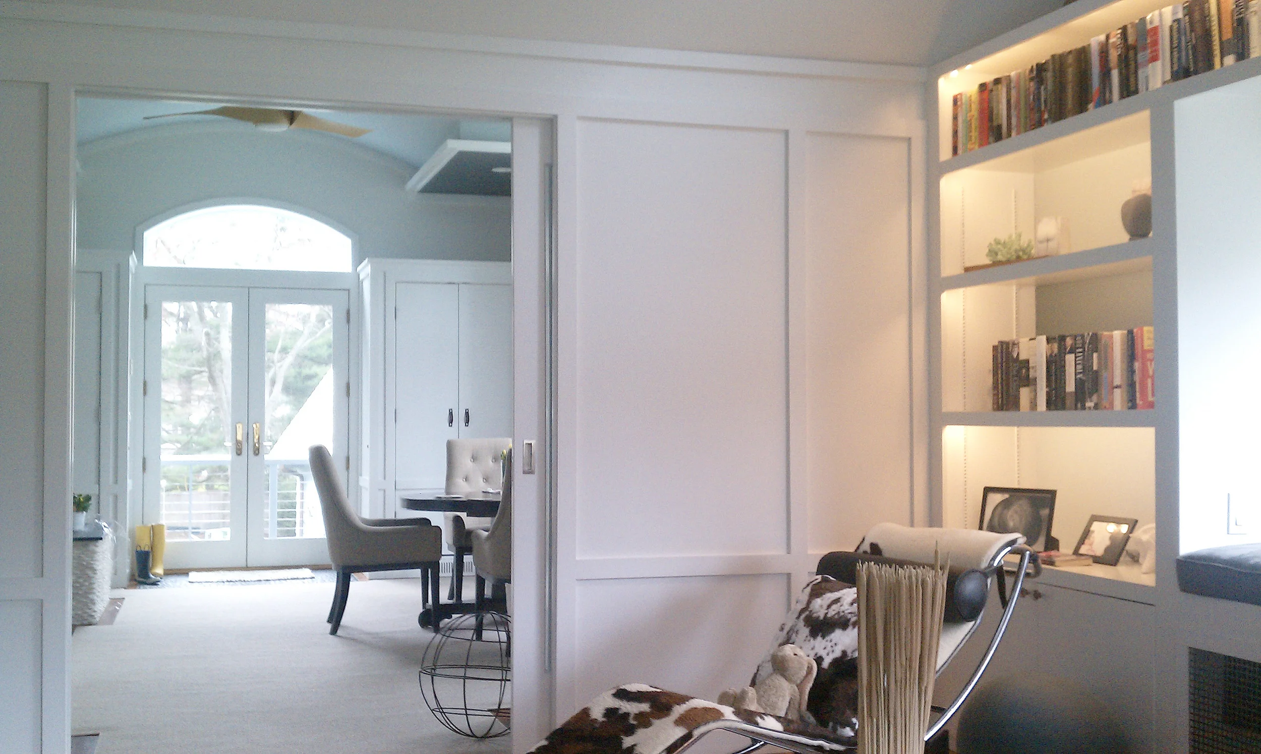 sophisticated sliding white paneled doors