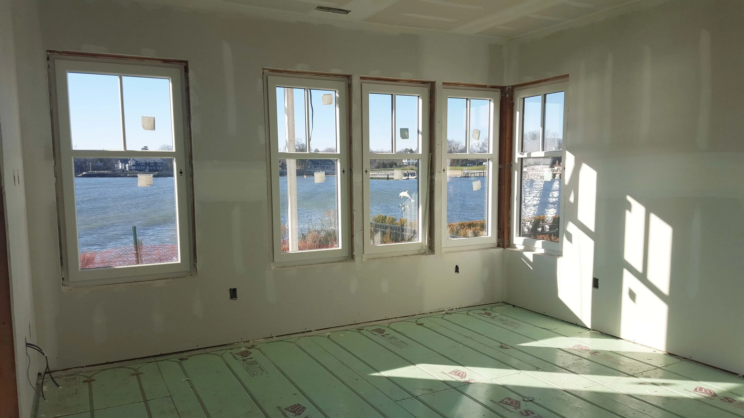 vickers interior windows with flooring in progress.jpg