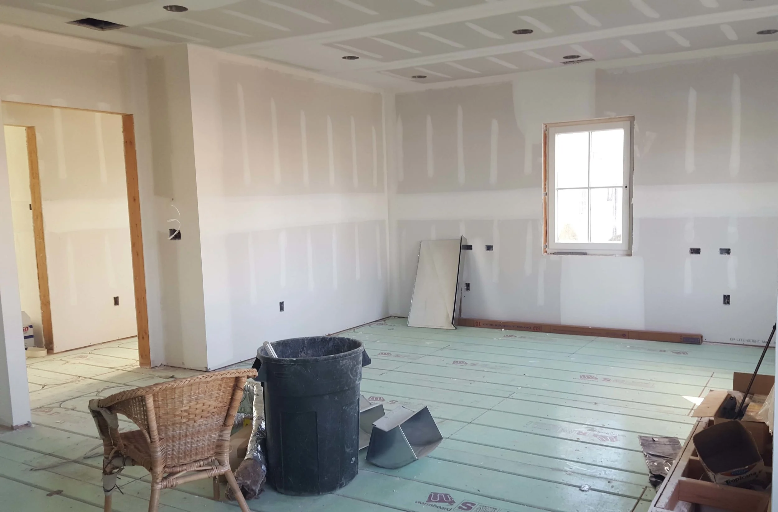 Sheet rock is up and radiant floors are installed throughout the home. 