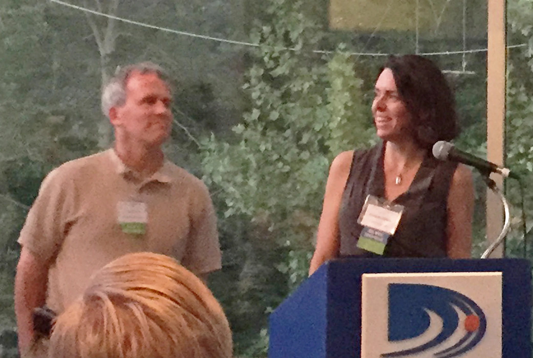 Chris Trolle (BPC Green Builders) + Elizabeth DiSalvo (Trillium Architects) accept the Residential Award of Honor at the CTGBC event.