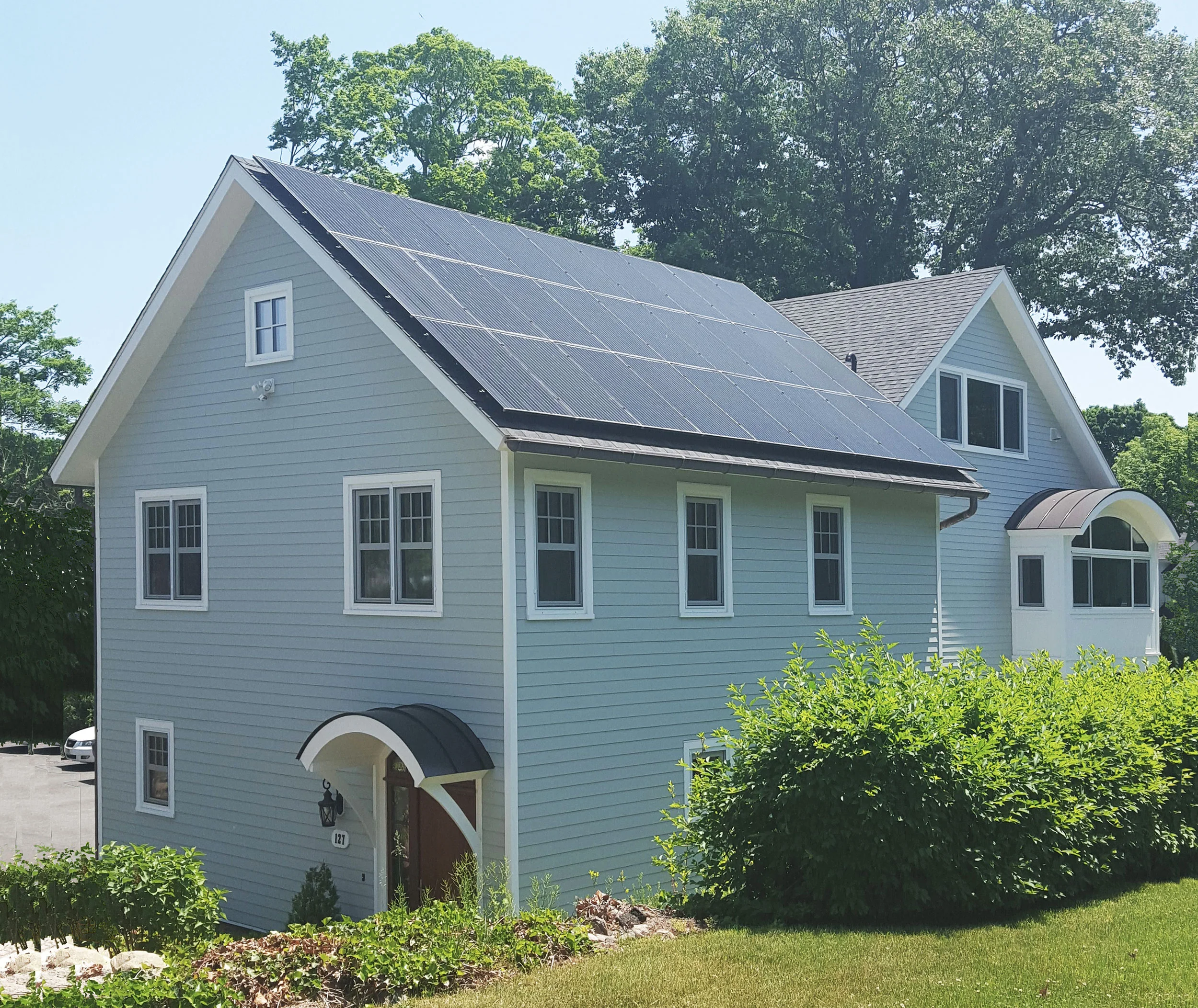 A new home in New Canaan achieves near net zero energy usage through solar panels combined with a very low electrically supplied heating and cooling load.