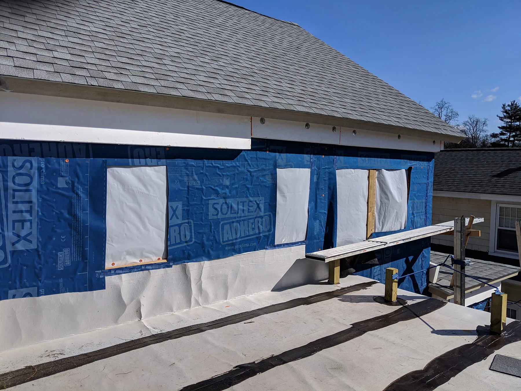 Westchester Passive House 2.26 roof and wrap.jpg