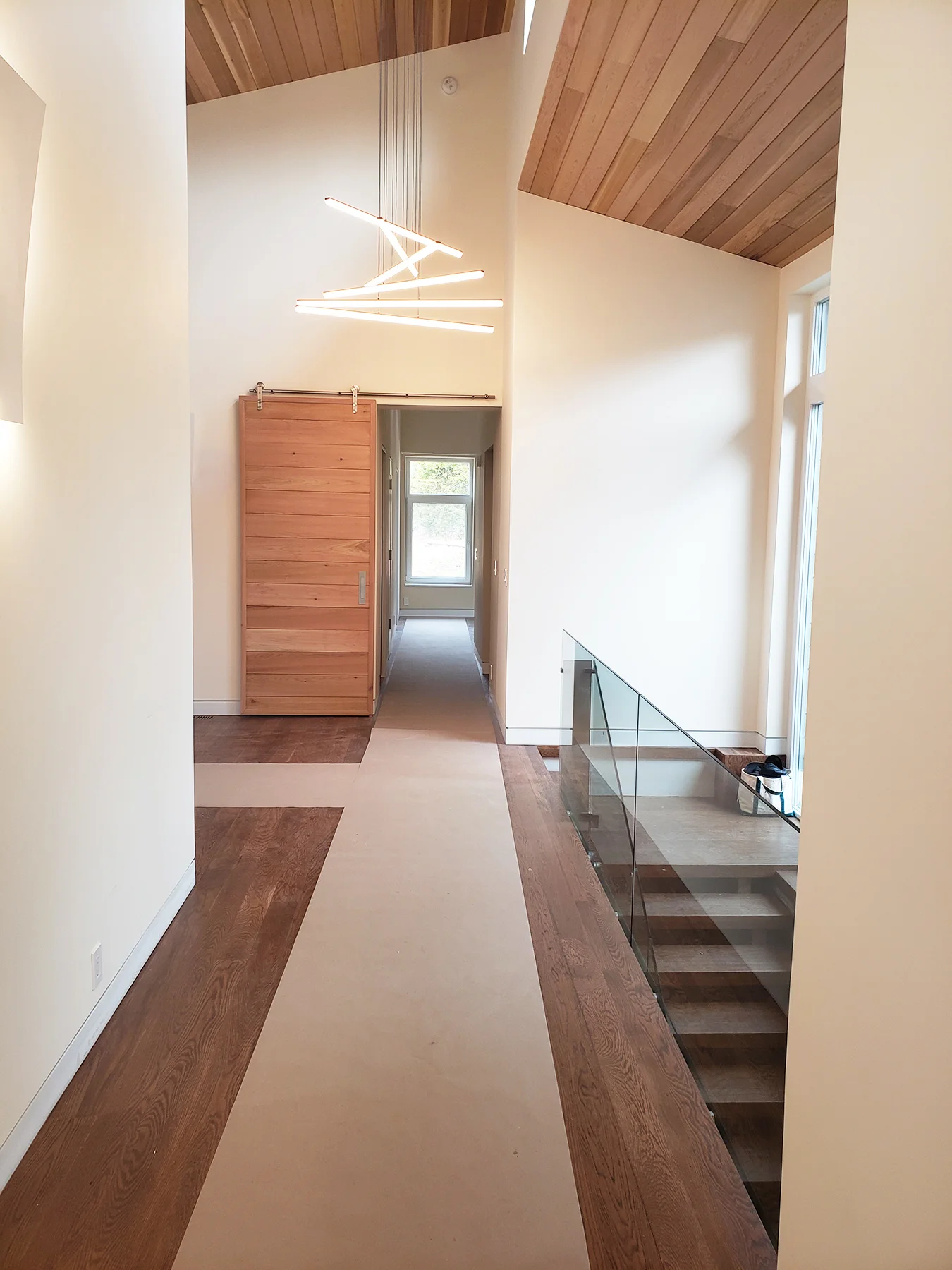 hallway with stairs and chandelier 4.11.19.jpg
