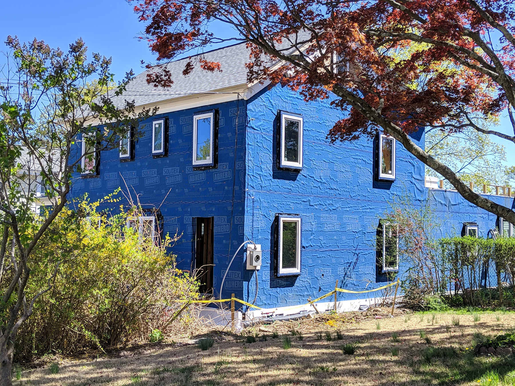 4.24.19 Westchester Passive House exterior blue wrap.jpg