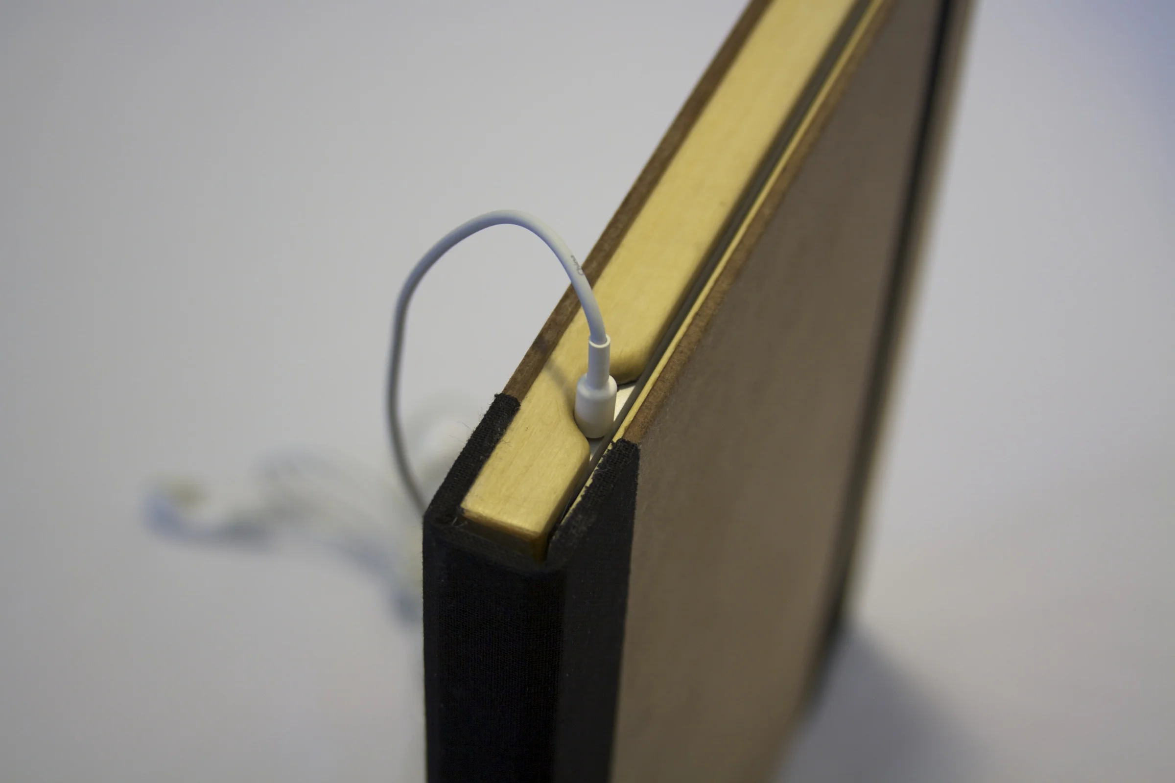 Old Book Case - Headphone Cable in