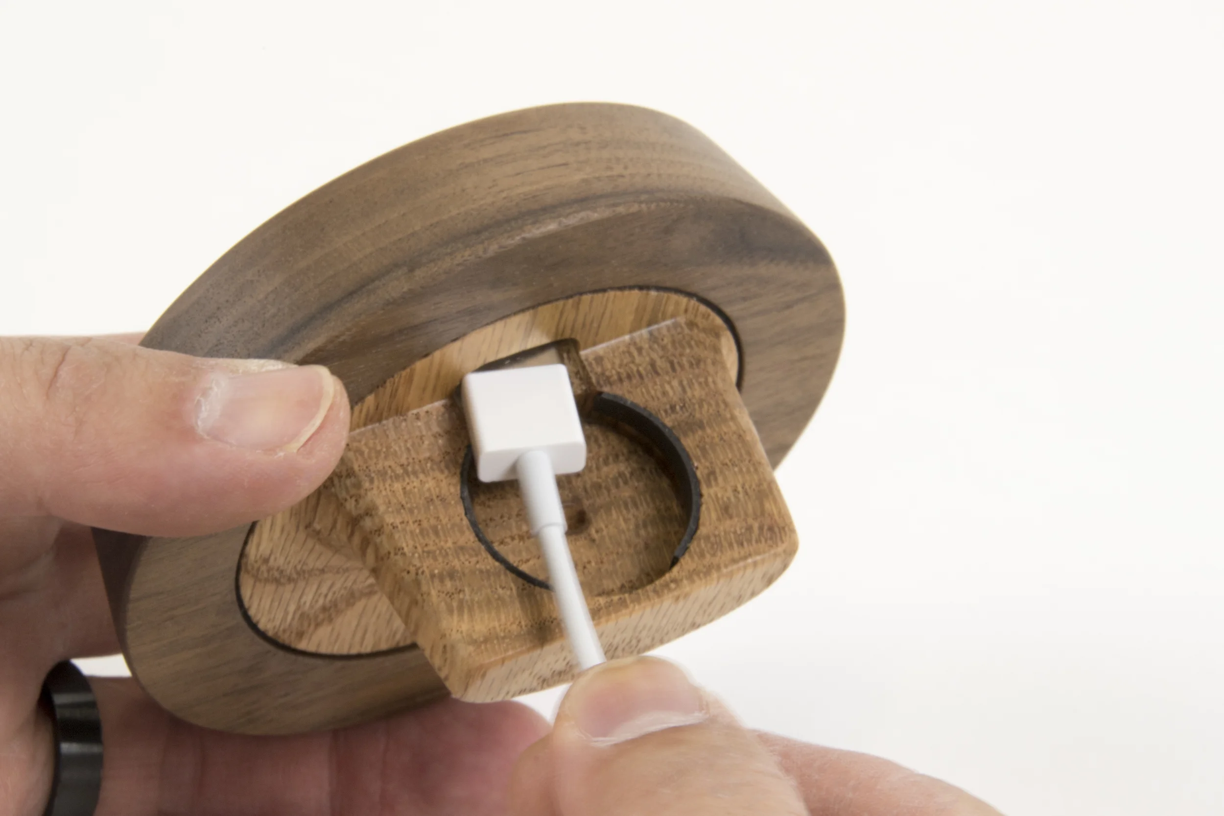 1. Insert the USB end of the cable through the hole.