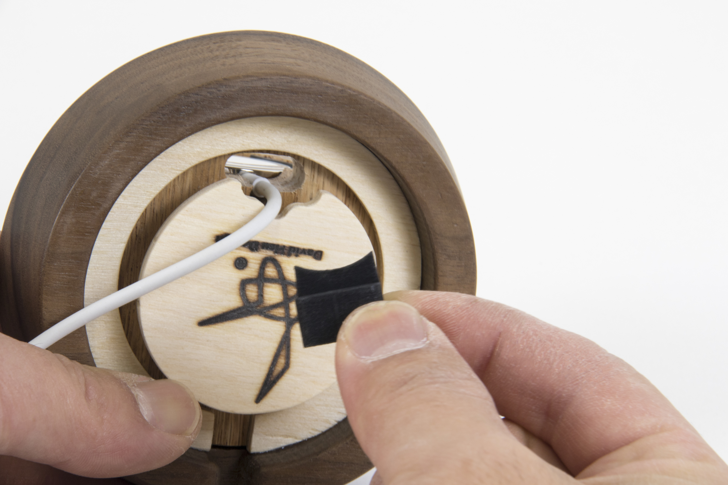 4. Insert the cable plug into the hole...