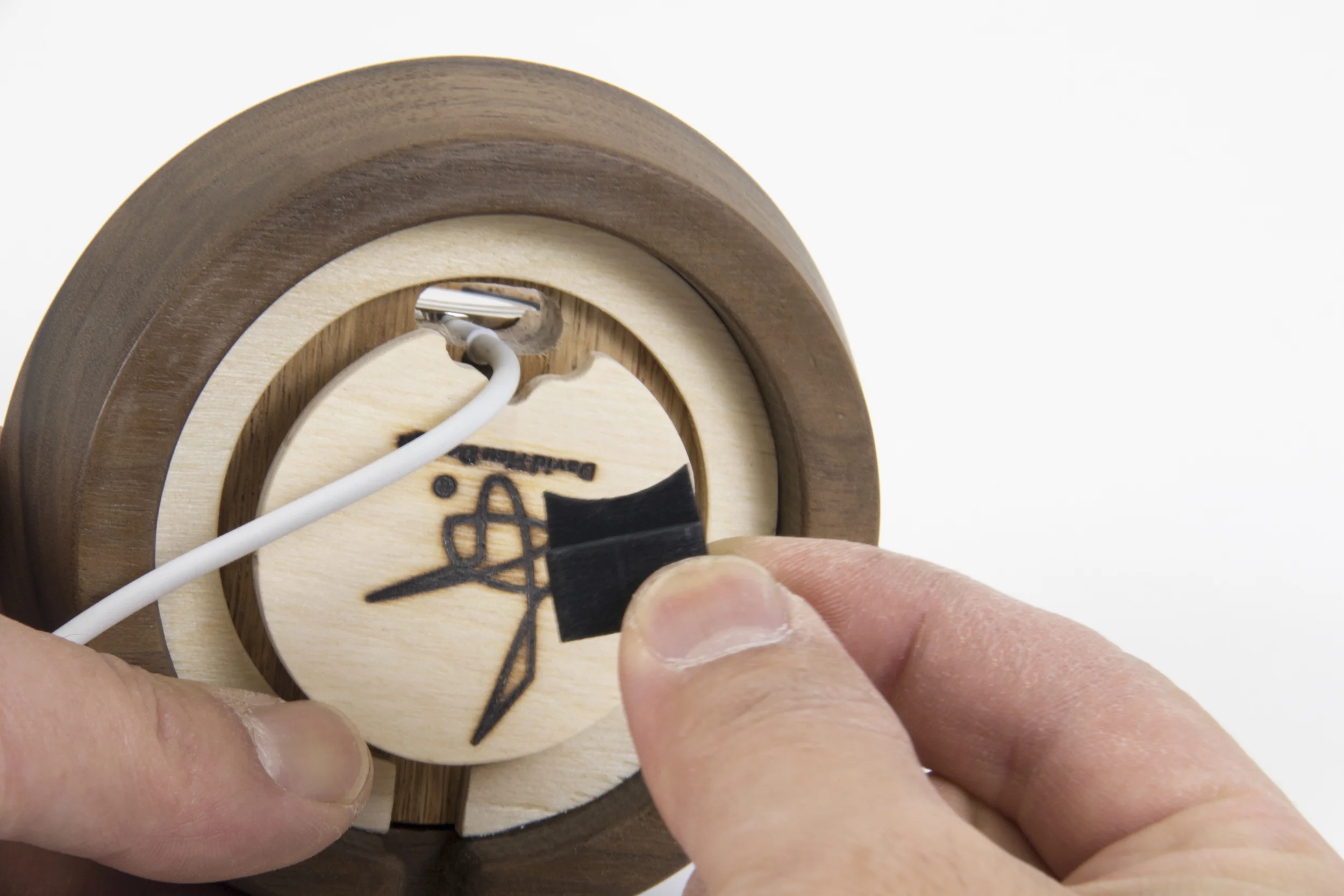 4. Insert the cable plug into the hole...