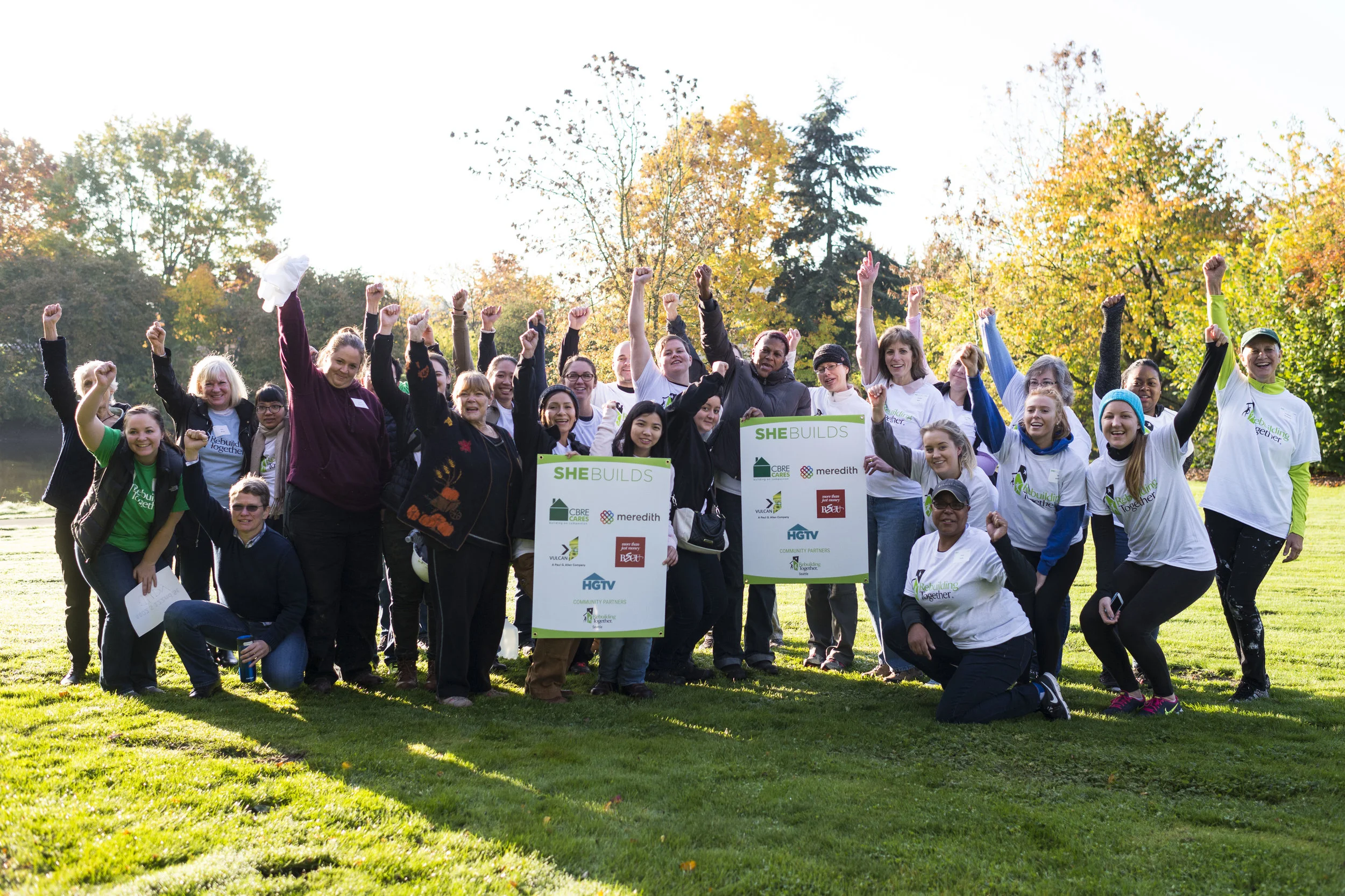 Volunteers from top sponsor, Greenpoint Technologies , gather on Spring Rebuilding Day 2013