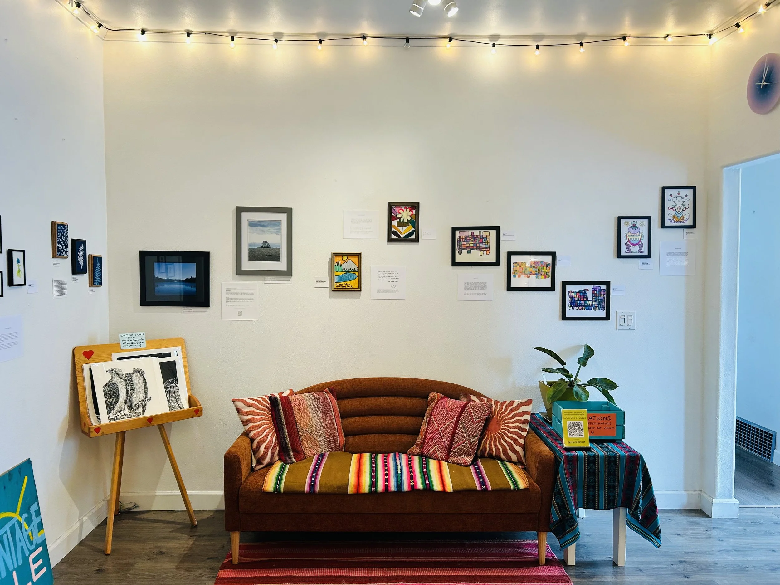 section of the Multitudes' show visual art on display