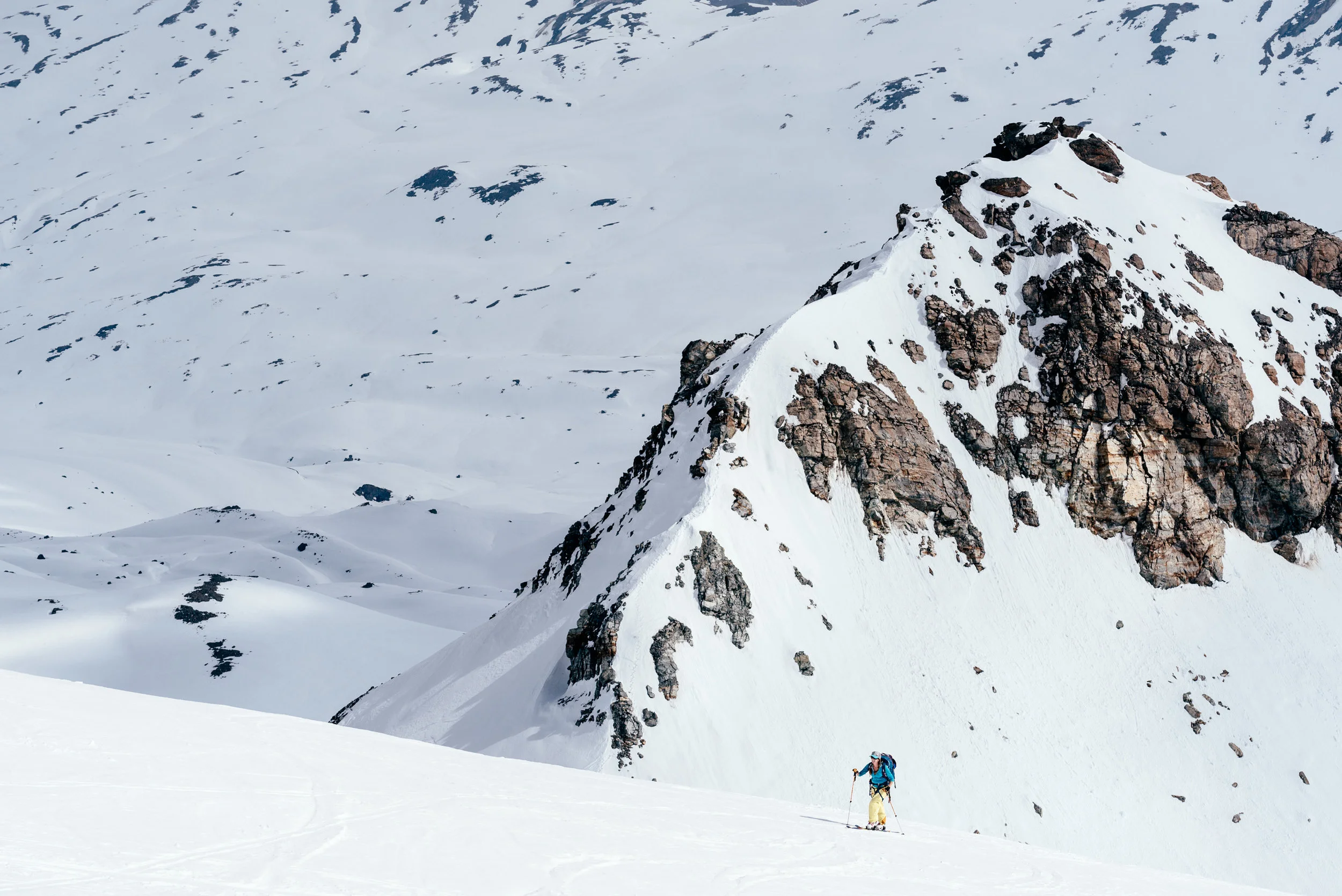 A touring setup will allow you to “skin” uphill, which is much easier and more efficient than bootpacking or snowshoeing.