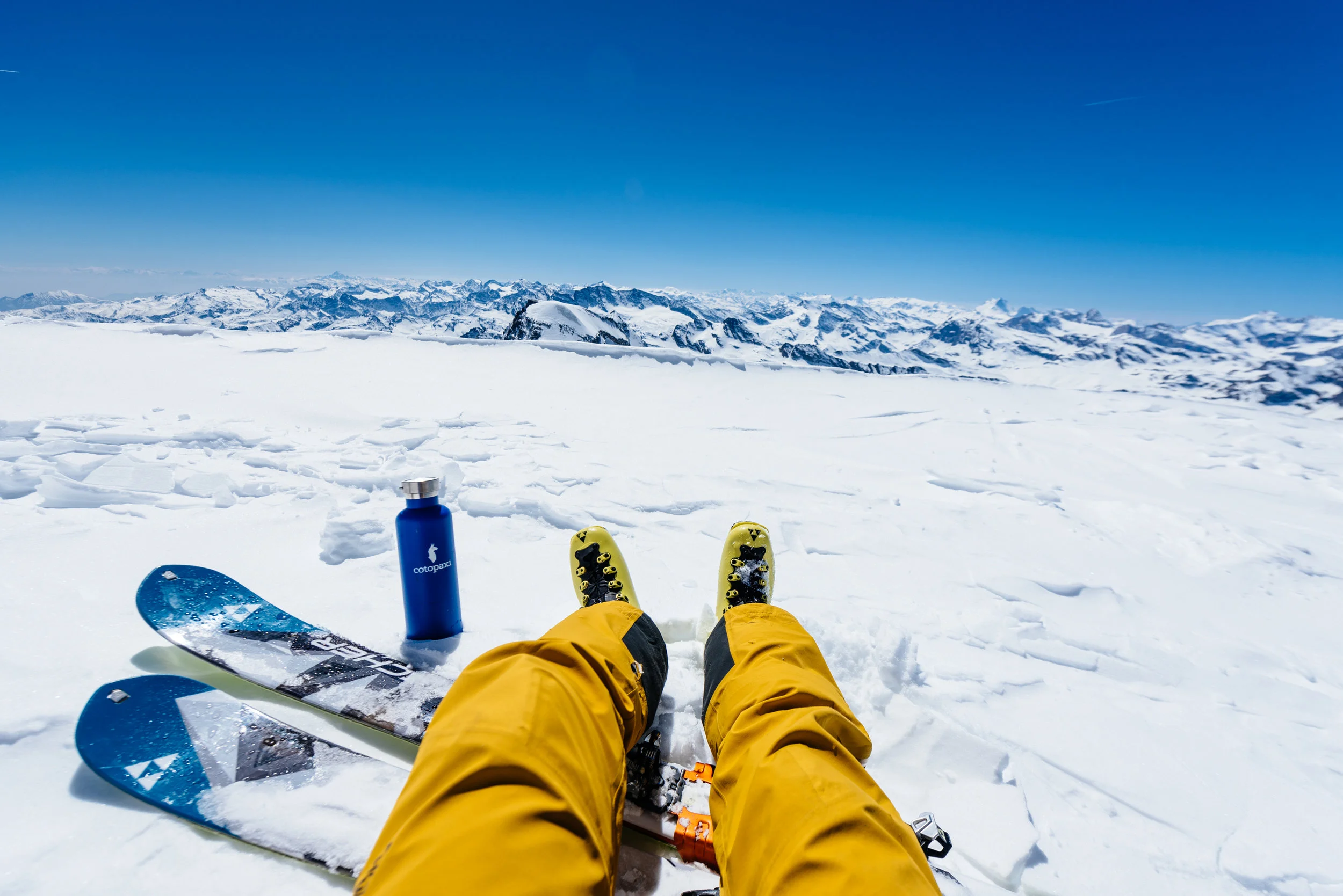 A backcountry touring kit consists of skis, touring bindings, touring boots, and skins.