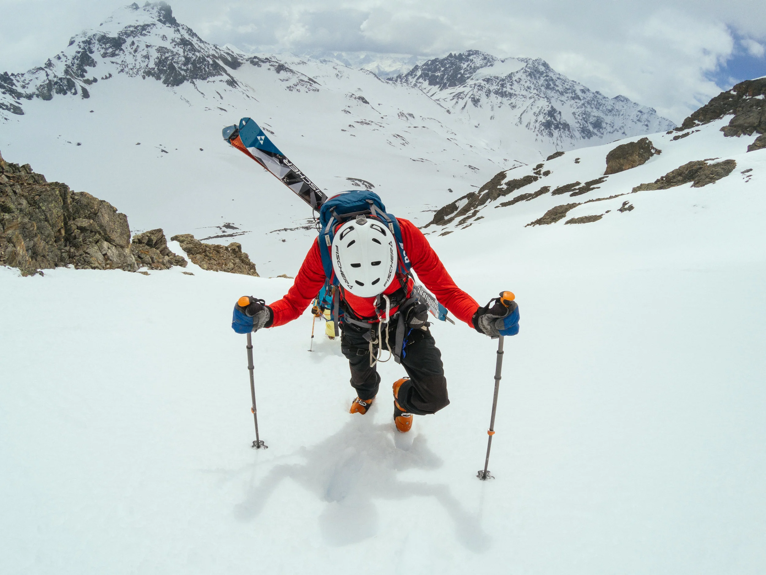 Bootpacking up a colouir to ski some steeps on Austria’s classic Silvretta Tour with Jeff Banks.