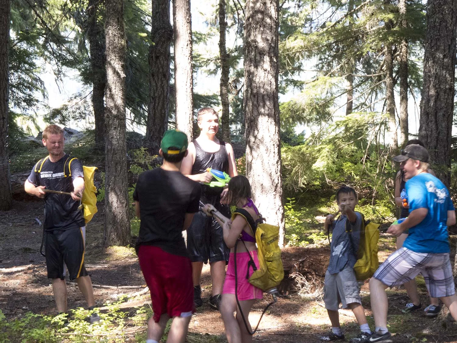 The kids cooling off with a great water fight.