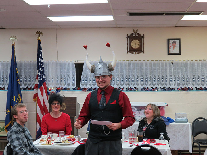 Mikel giving a presentation on the history of Valentine's Day