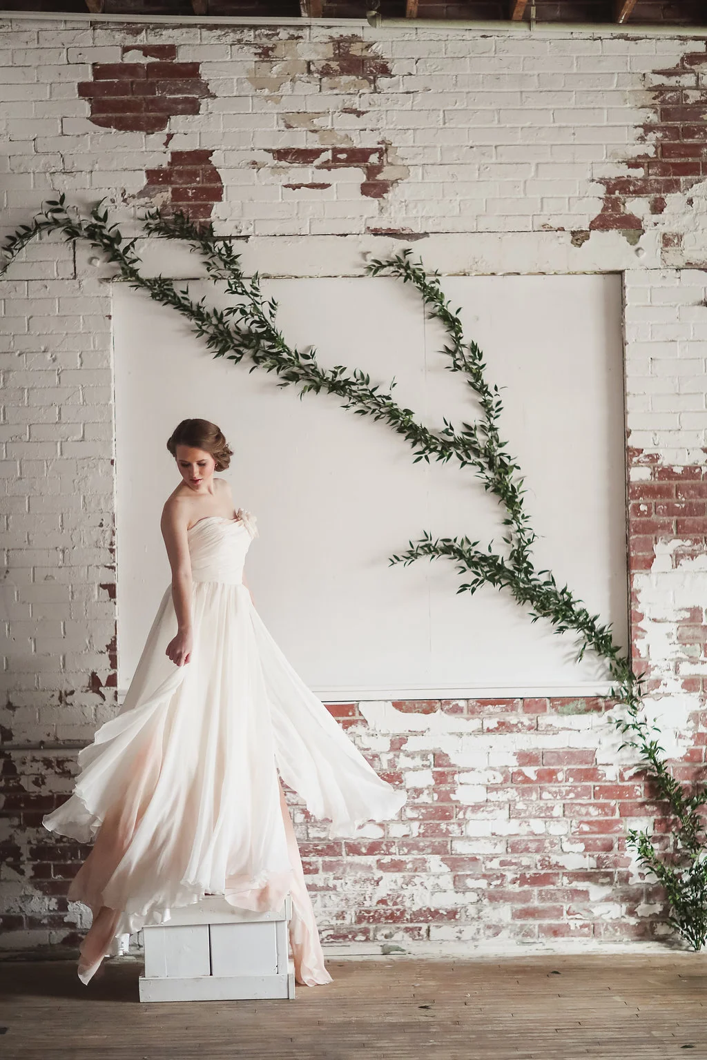 Another incredible gown by Eugenia Couture featuring a floral installation by Allium Design