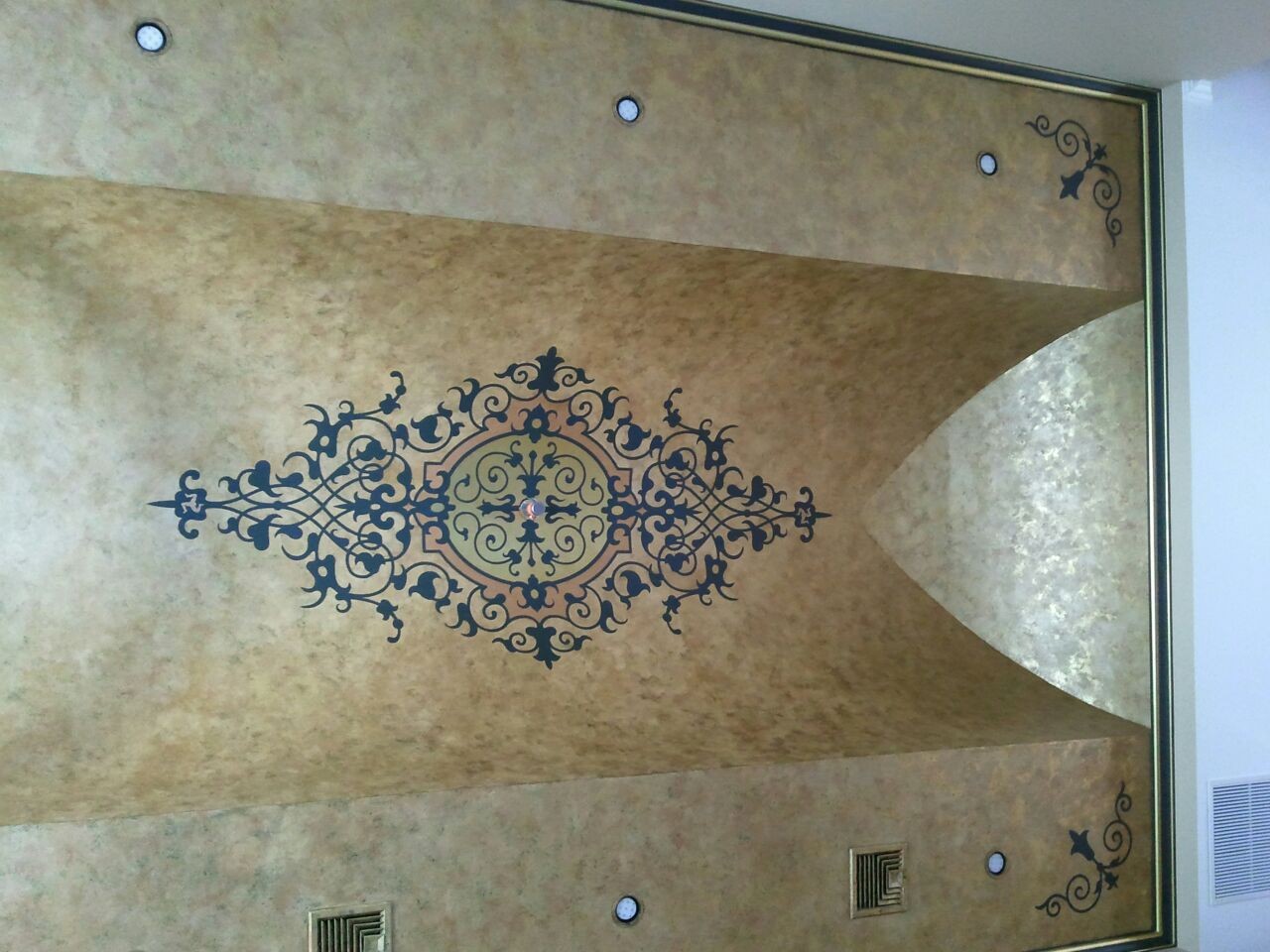 metallic gilded ceiling with medallion