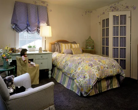 Hand Painted floral details and customized touches complete this designer's children room showcase. Collaborations with Robin Schultz Interiors.