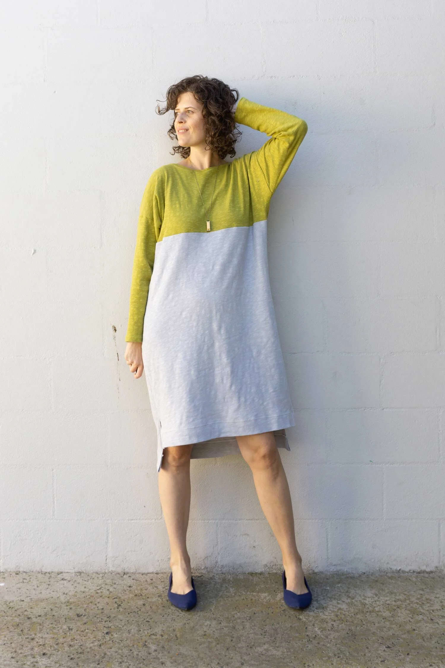 sweater on top of dress