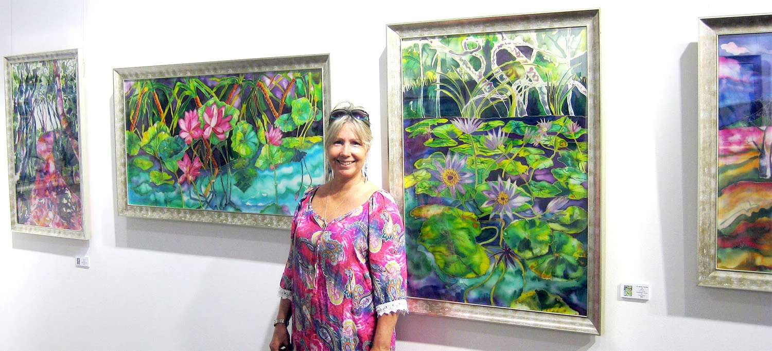 robyn and paintings.jpg