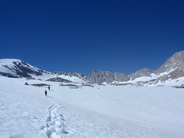 Deep tracks in the snow approaching Forrester Pass.