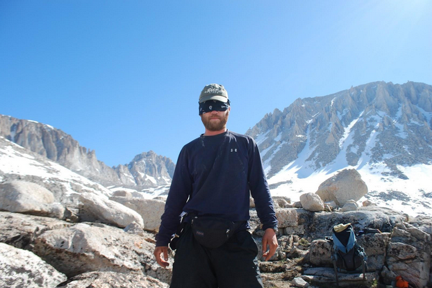 Picker, AKA The Sierra Bandit, cuts holes in a bandana after losing his sunglasses to prevent snow blindness , which can occur due to the sun reflecting off the snow.