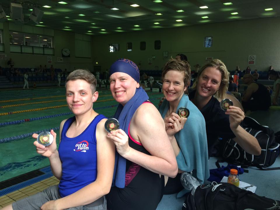 Women freestyle relay winning a gold