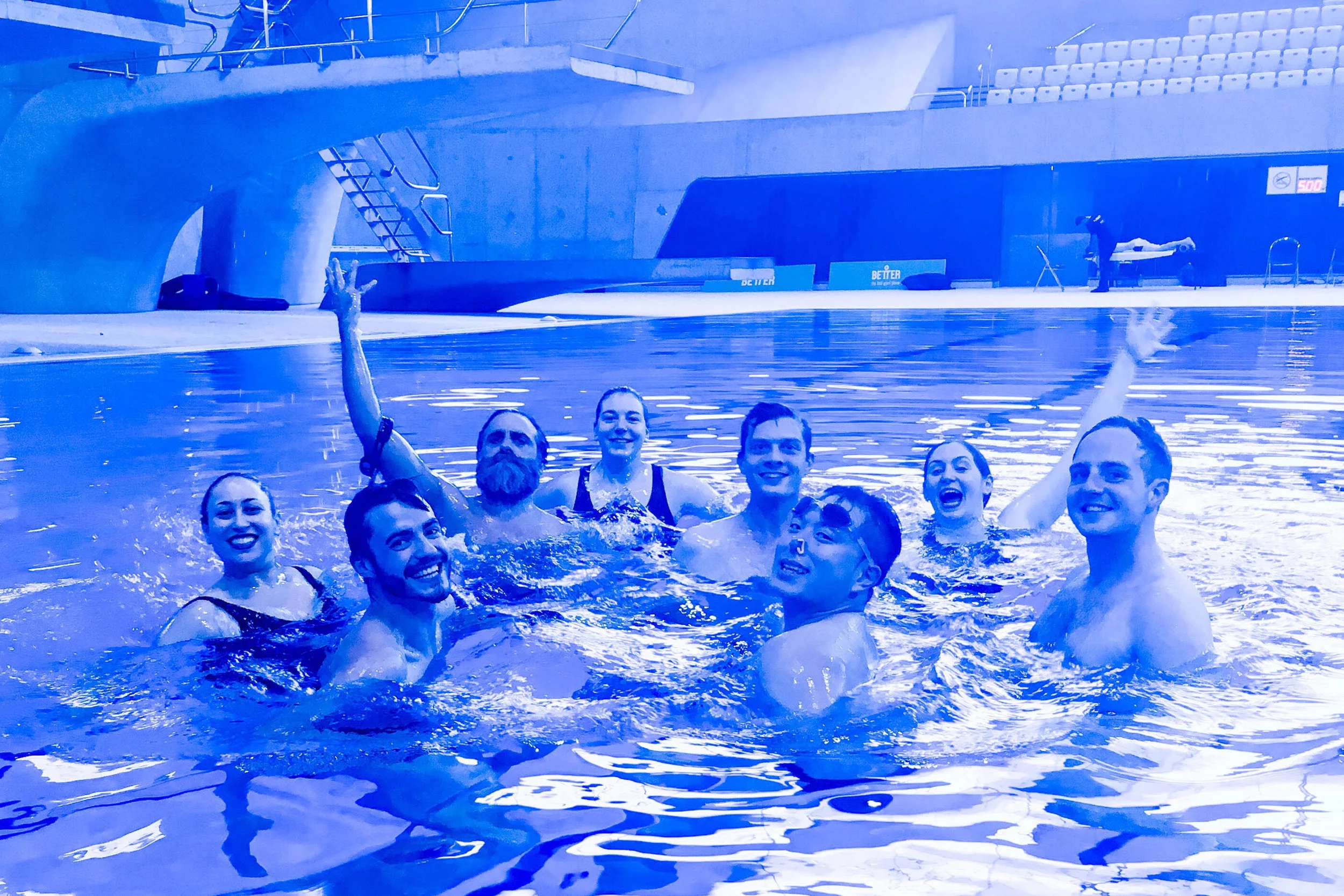 Beginners team relaxing after a display at the London Aquatics Centre