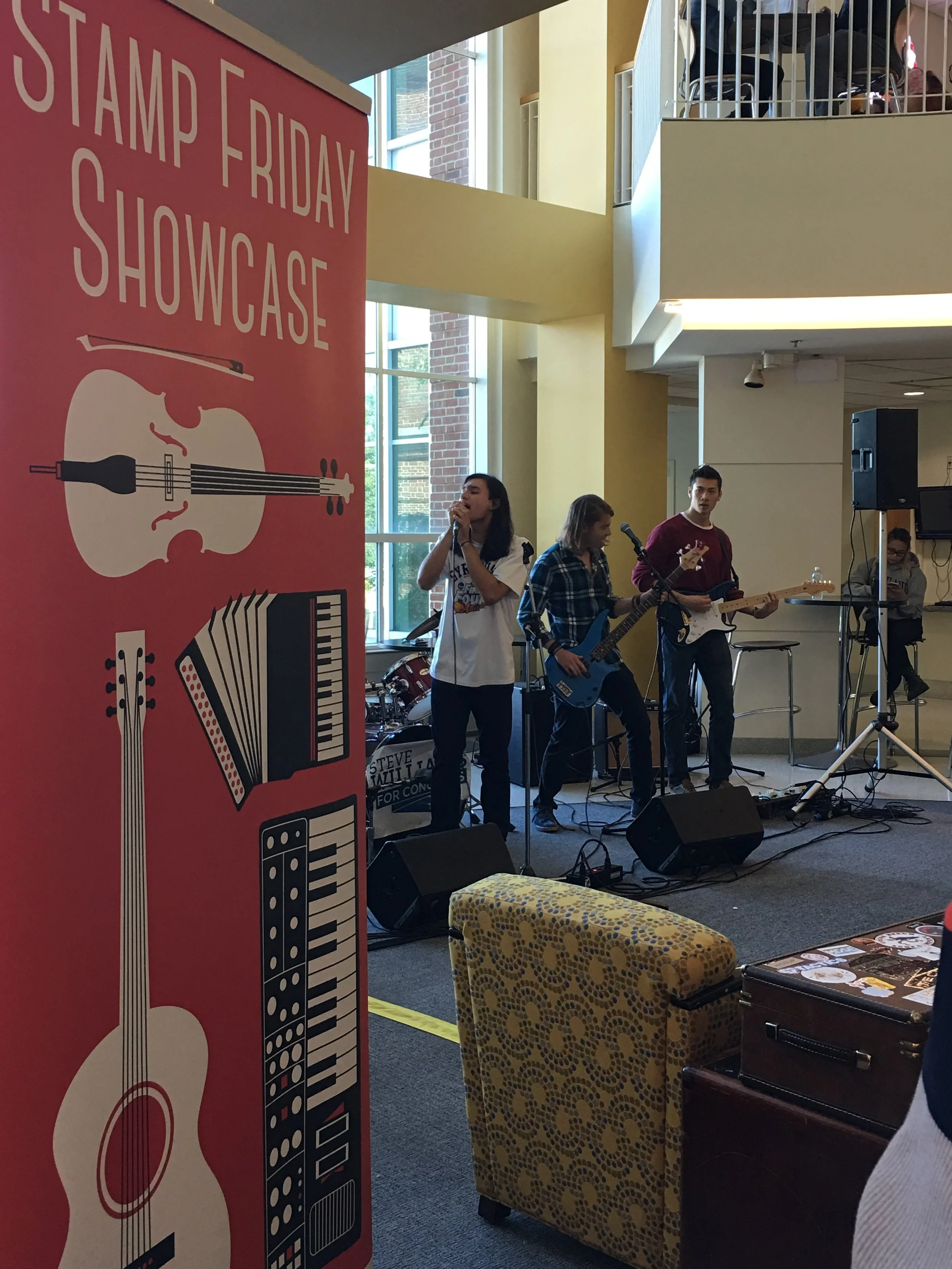  Matching signage was created to delineate the performance space before and during the Friday concerts.  