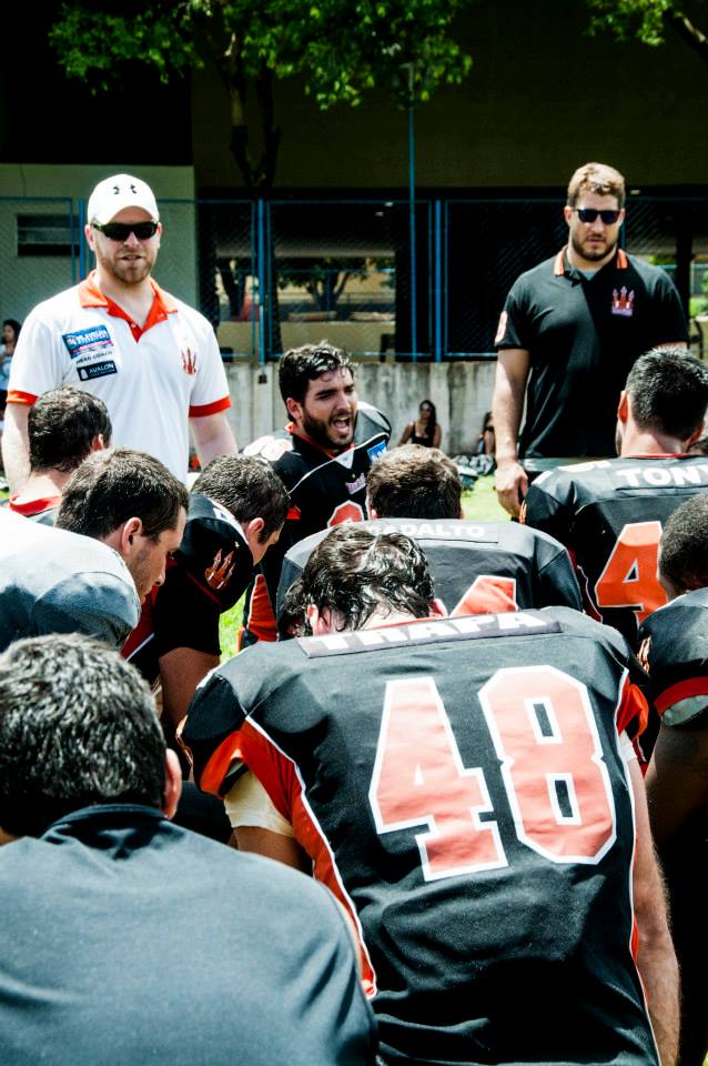 Coach Levy and NFL All-Pro Center Alex Mack of the Cleveland Browns address the team.