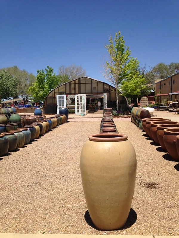 When I own property to park my trailer and portable front porch on one day, I will fill my yard with ceramic pots like these. 