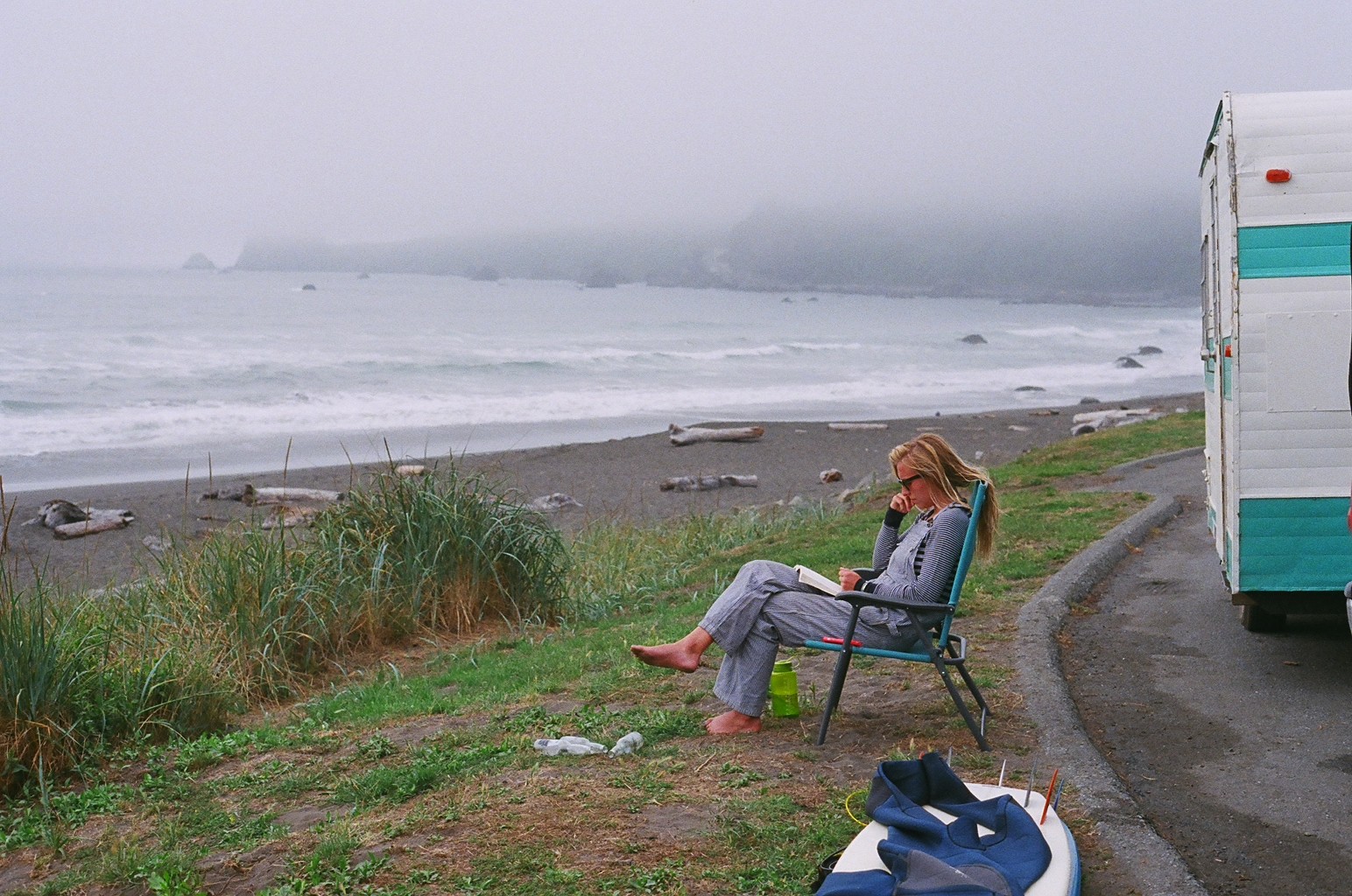 Photo Disclaimer: the bottles in front of the chair are bottles we picked up from the beach. They were not all consumed by the individual sitting in the lawn chair. 