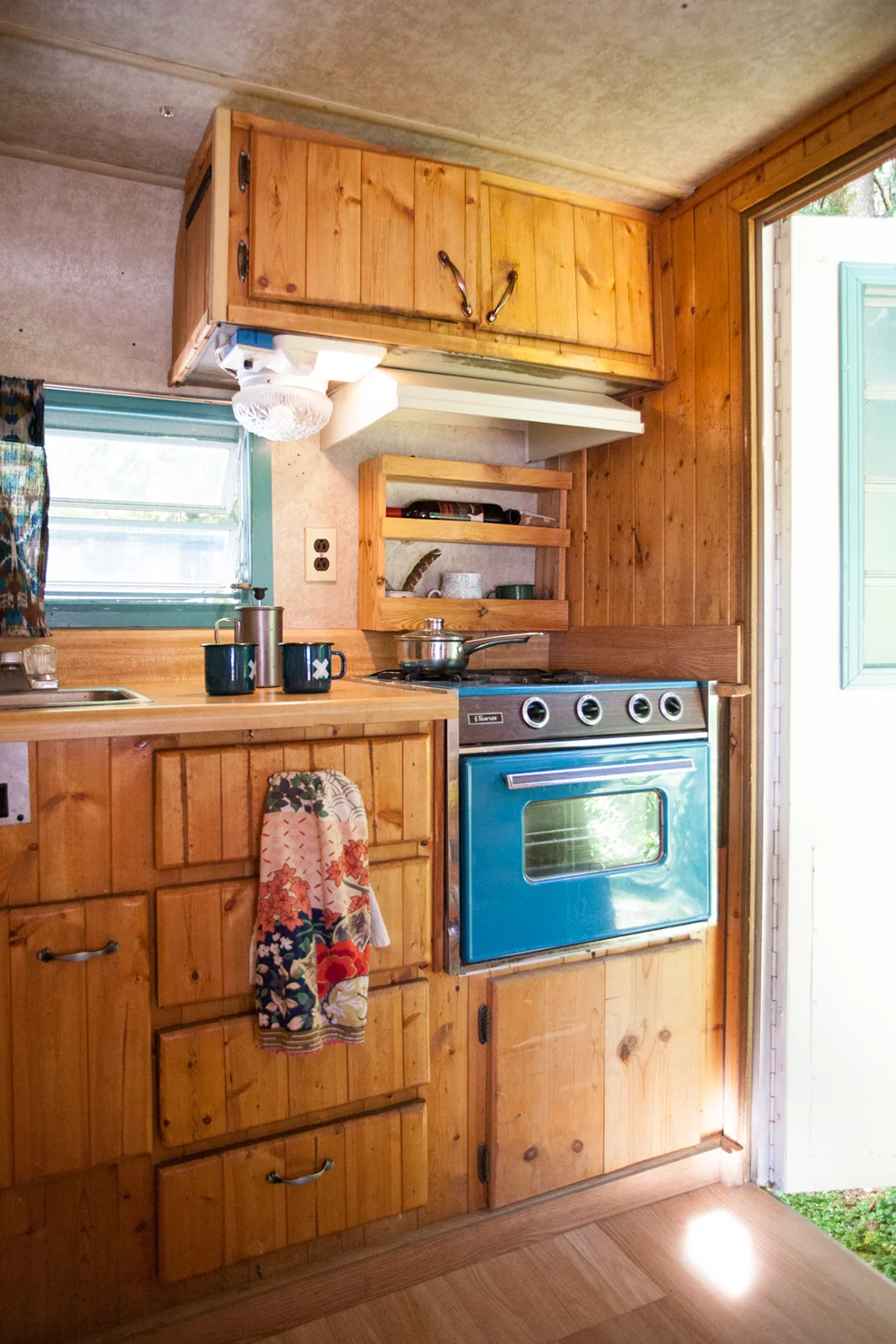 The kitchen is my favorite part of Lucille, because we both love to cook and there is just enough room for dancing! The original oven was one of the main selling points, not only does it work, but it happens to be my favorite color. 