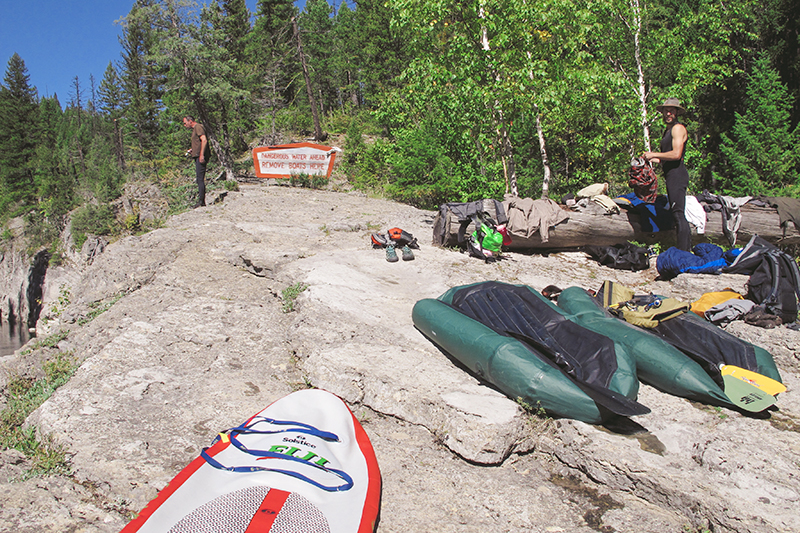 The sign read "Dangerous Water Ahead Remove Boats Here" as we paddled to the take out. It would be the last time on this trip that we had to deflate our vessels and pack them into our bags. It was only a four mile hike to the trail head where my brother would be waiting for us with beers in hand, but we took our time there on the rocks overlooking the turquoise water. It was the end of a beautiful week and I know none of us were ready for it to be over. 