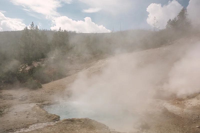 It's only a 40 mile drive to the falls, but we took our time, stopping at just about every water landmark on the way. Standing six feet away you could feel the intense heat radiating from the hot springs. I couldn't resist touching the water and quickly realized why there are barriers surrounding each pool.