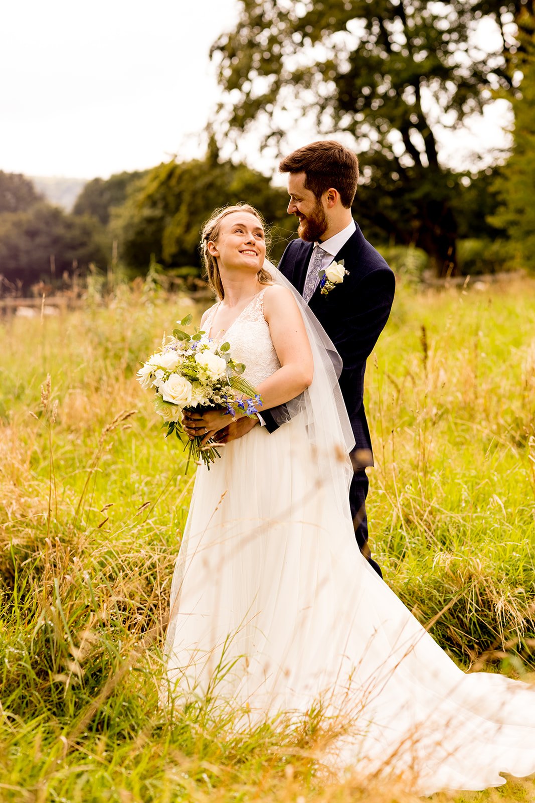 Bride and groom in outer walled garden