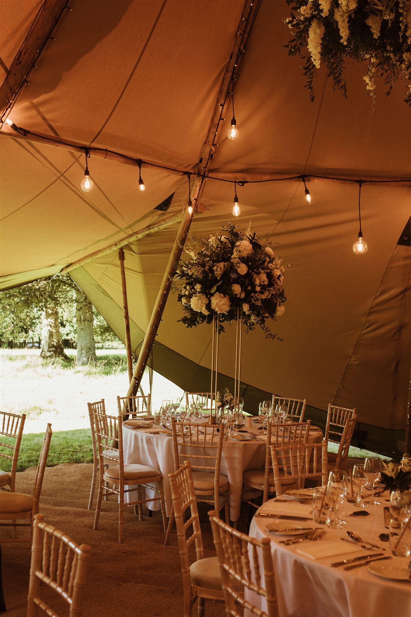 White wedding flowers in Tipi