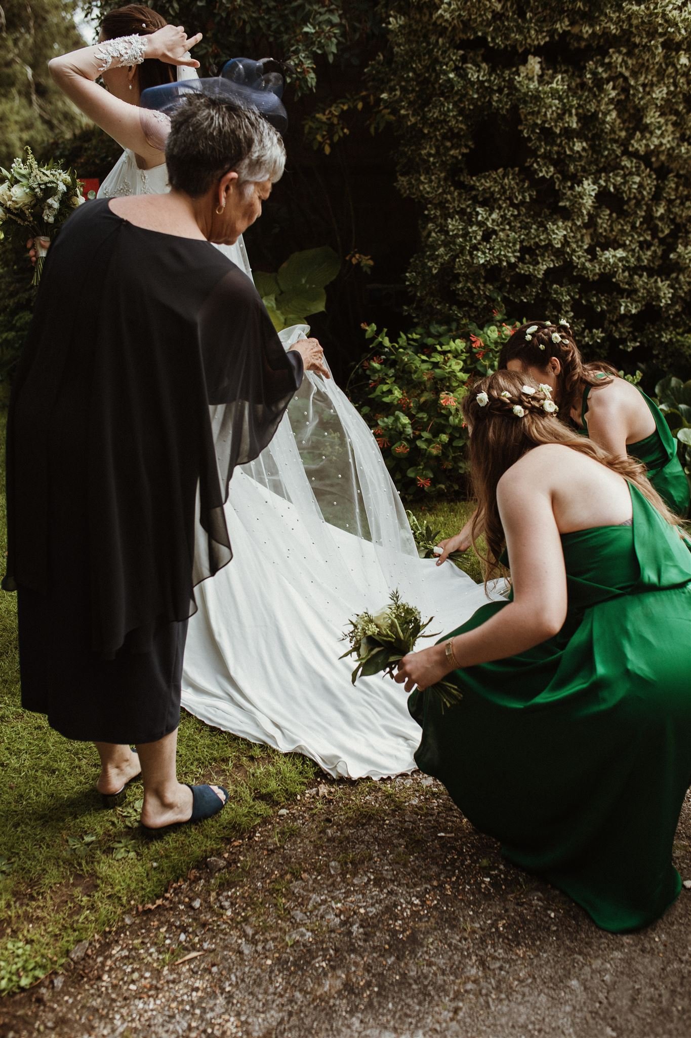 Adjusting the bride's train