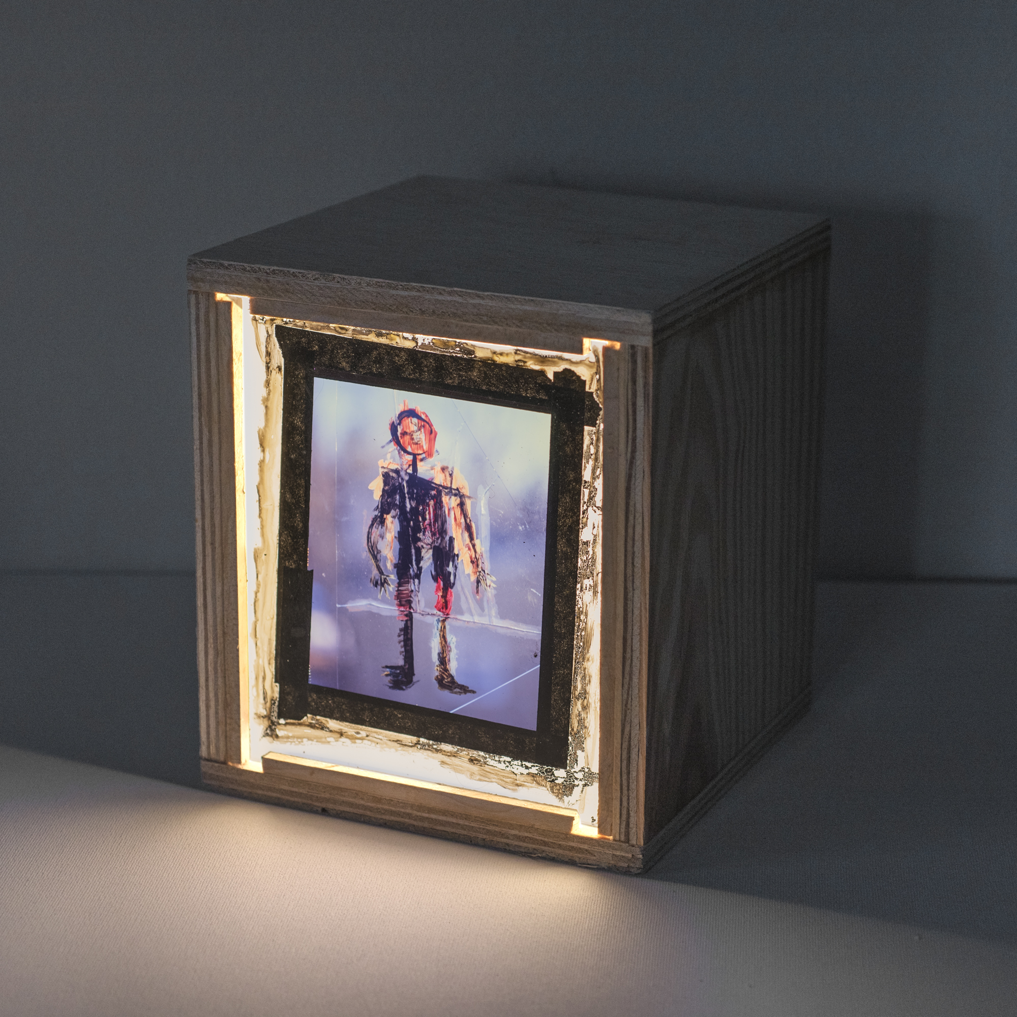 Visitor Don , 2016 Color Slide Film, Paint, Tape, Plexiglass, Wooden Light Box 