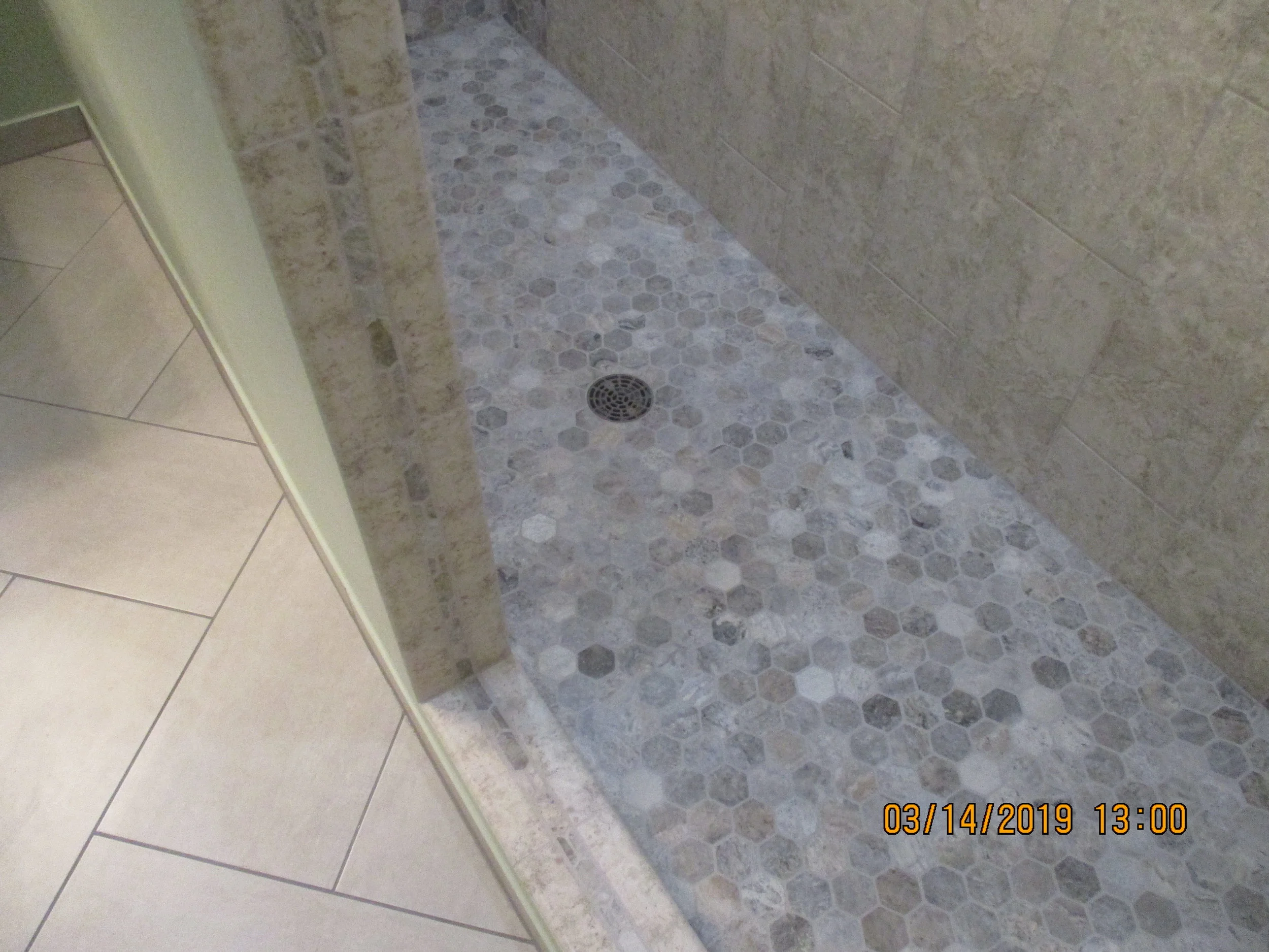 New herringbone style floor tile, custom shower pan