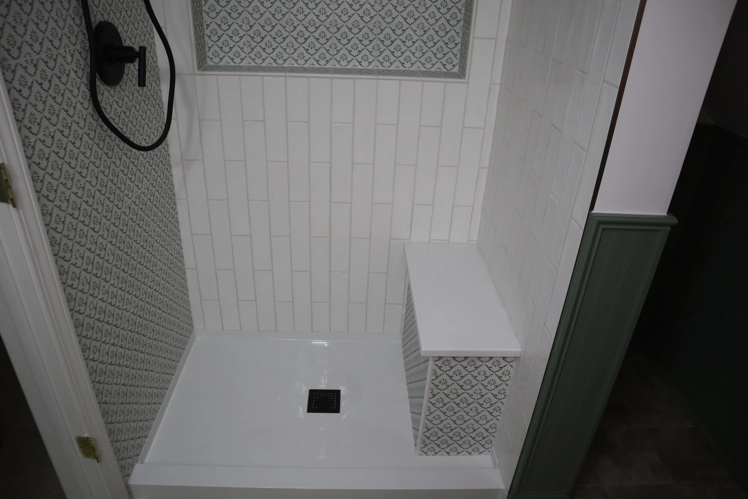 After- 2025 48" Fiberglass shower with tiled walls