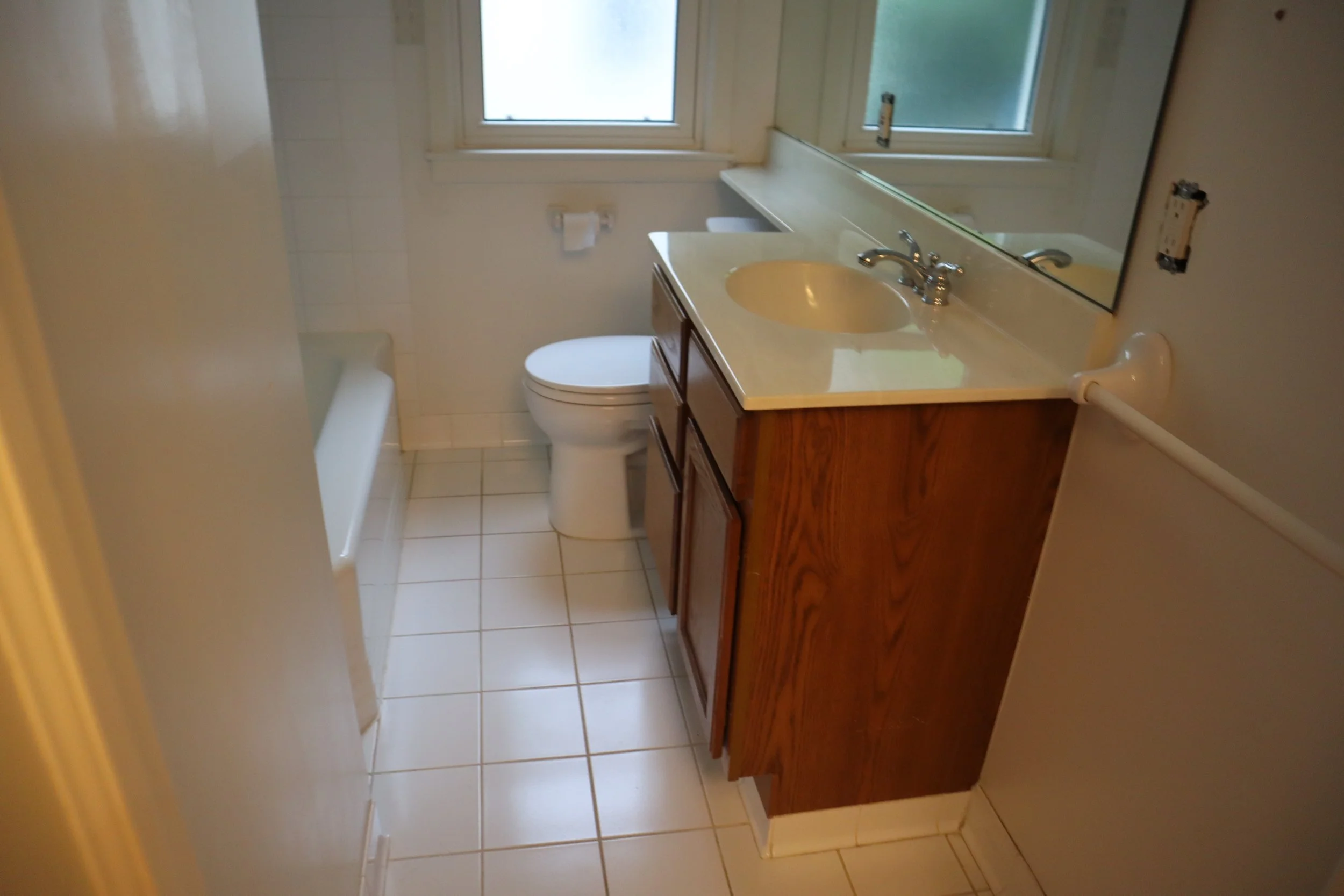 Before: Vanity cabinet & Square floor tile