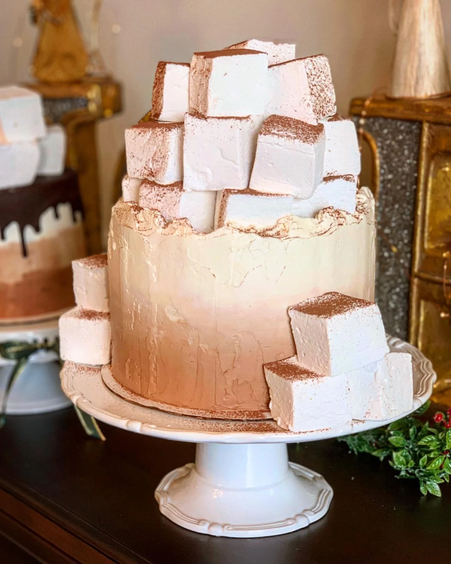 Hot Chocolate Cake! ☕️🎄✨
Cake - dark chocolate, milk chocolate &amp; vanilla layers 
Filling - chocolate Swiss meringue buttercream &amp; marshmallow fluff
Buttercream - a gradient of chocolate &amp; vanilla Swiss meringue
Topping - giant soft &amp;