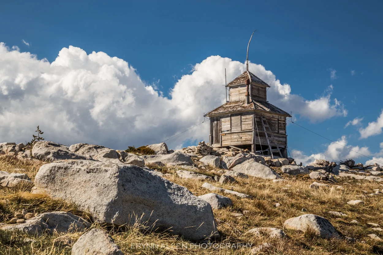 We worked so hard for this lookout. It was open and we went inside. There aren't many of this style still standing, and I love the run down look.