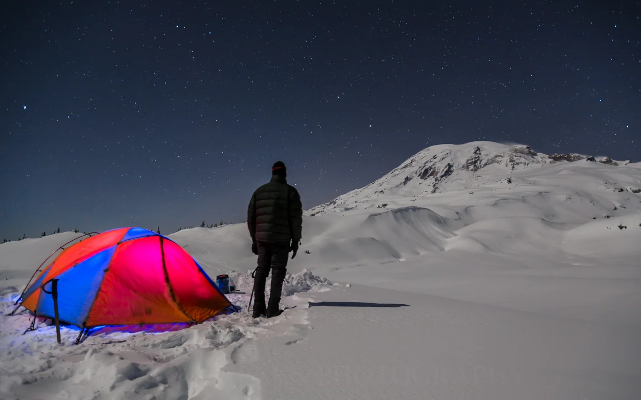 At 5am, Darin takes a break from reheating the water in our Nalgene bottles that had cooled off.