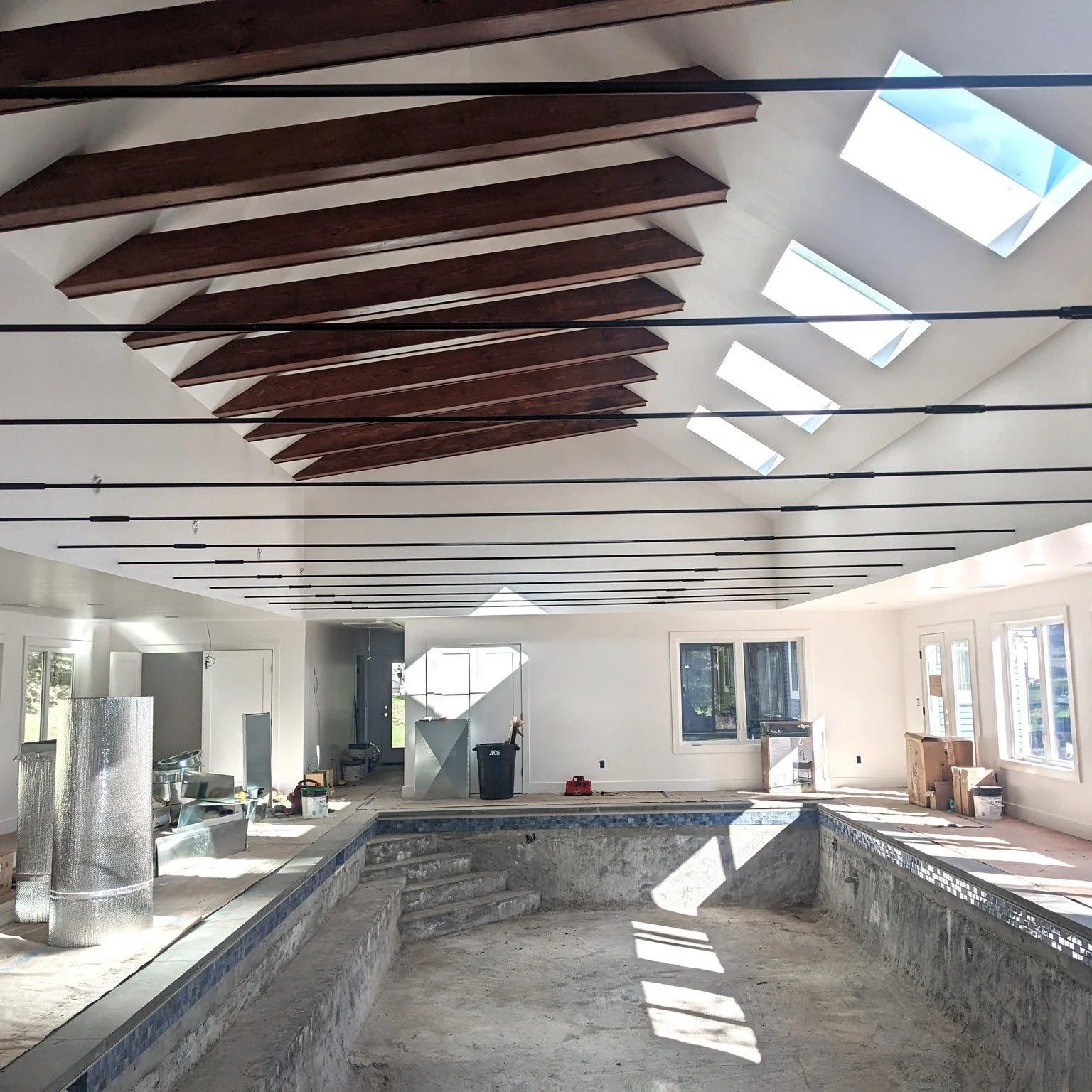 Let&rsquo;s pool our resources&hellip; And show you what we&rsquo;ve been up to in Olivebridge, NY. This under-construction poolhouse was designed to create a bright, open space over an existing pool - with tons of windows and skylights to drench the