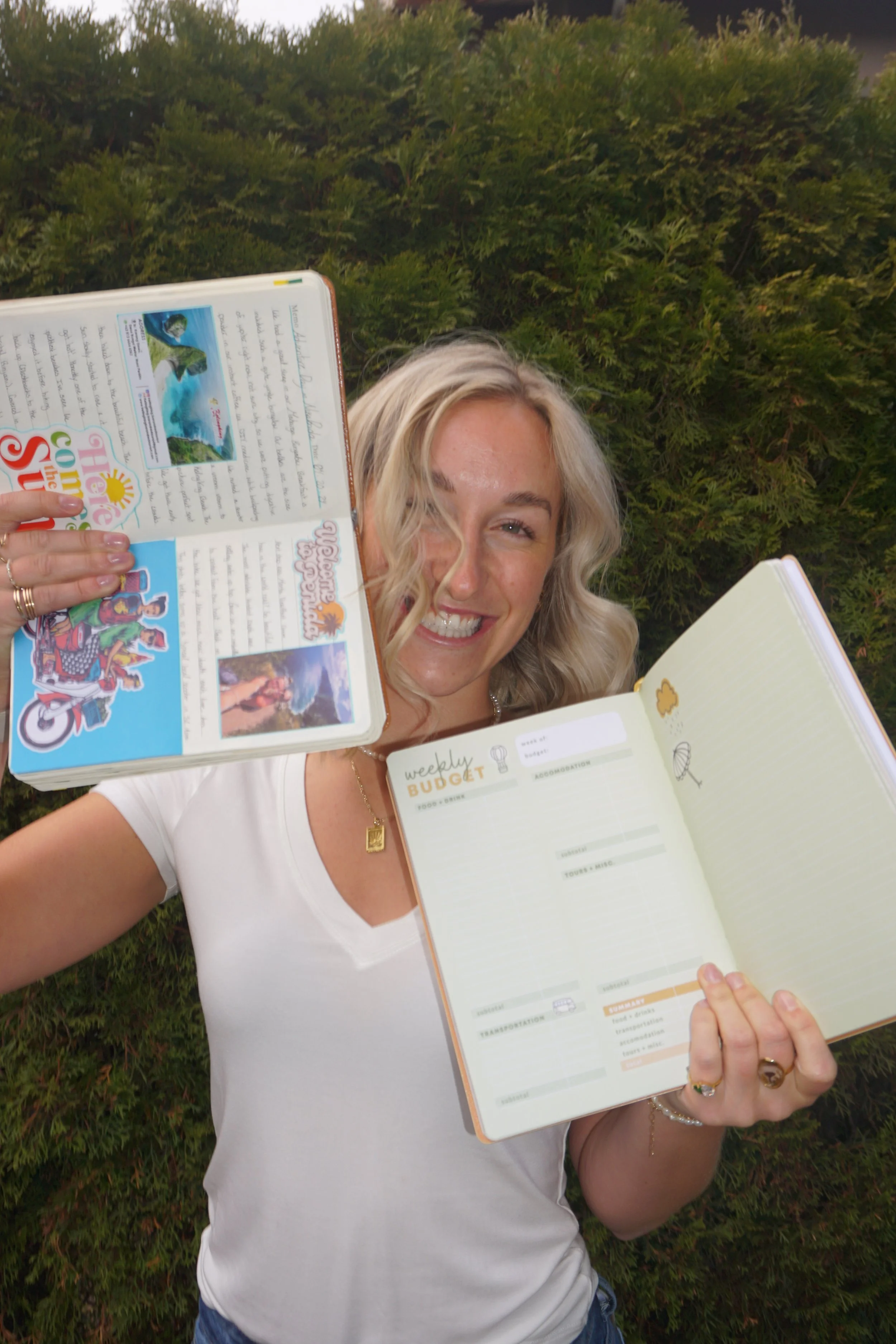 Jessie Copes posing with her book
