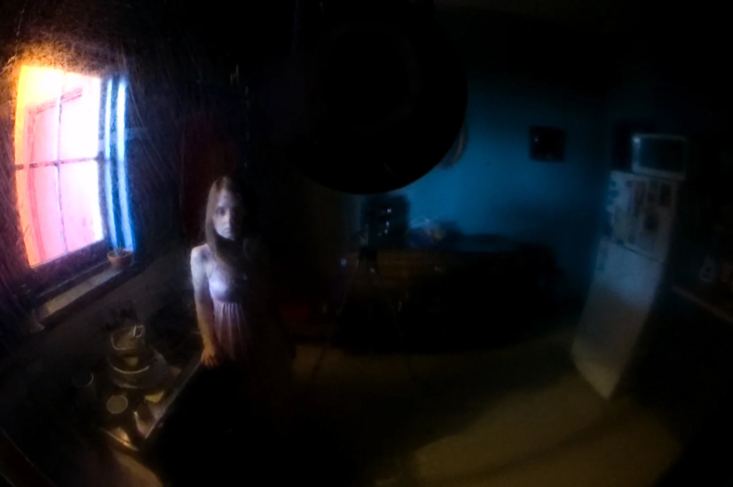 through a glass, darkly